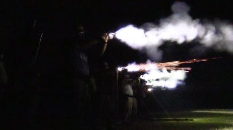 Students from the Collegiate Officer Program (COPS) during a night shoot at the Weatherford gun range.